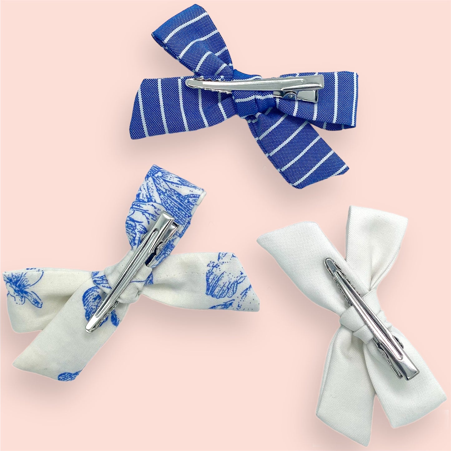 Upcycled Mini bow set of three in our Toile and Stripe series on alligator clips back view